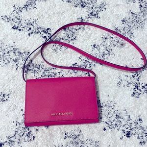 Michael Kors purse . Used maybe once, it looks brand new